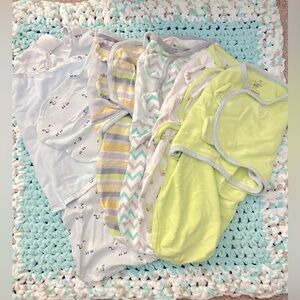 Baby swaddles, 1 Halo Sleep Sack Swaddle and 4. Swaddle me